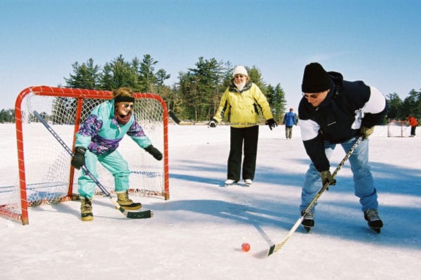 Couple "playing" hockey.