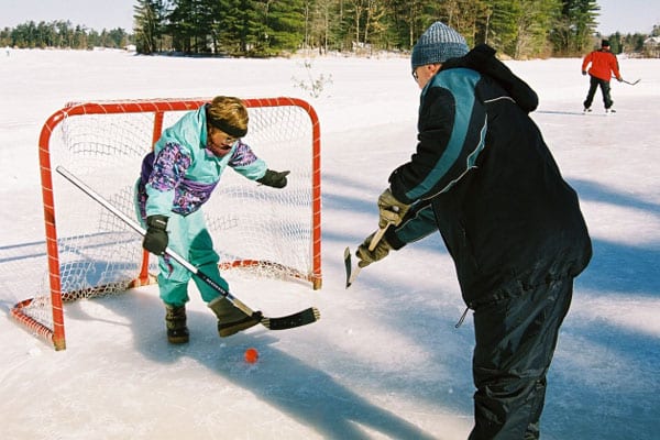 Couple "playing" hockey.