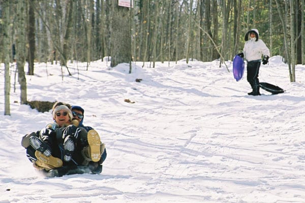 Couple sledding